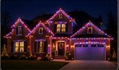 Colorful roofline holiday lighting